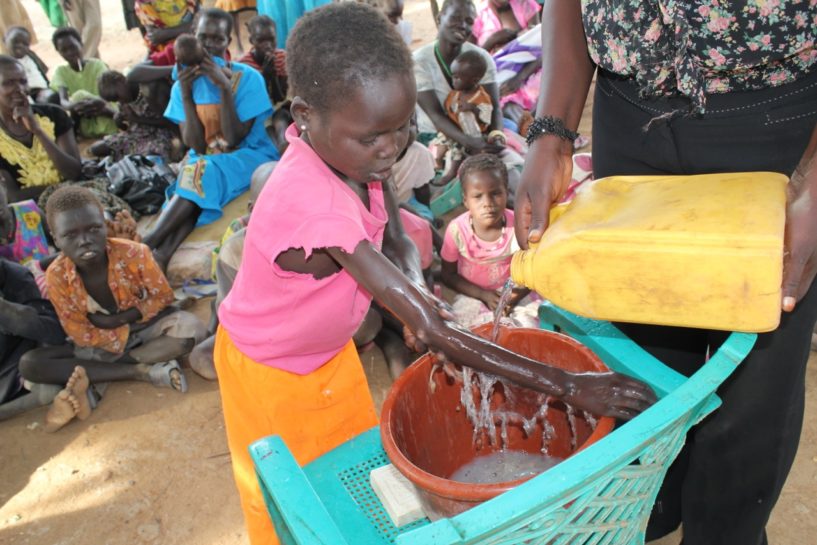 Drop in the Bucket teaching about the benefits of hand washing to refugee children in South Sudan