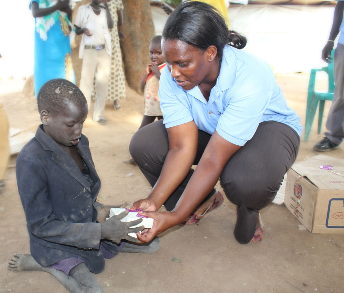 Drop in the Bucket staffcdistributing soap to refugees in South Sudan