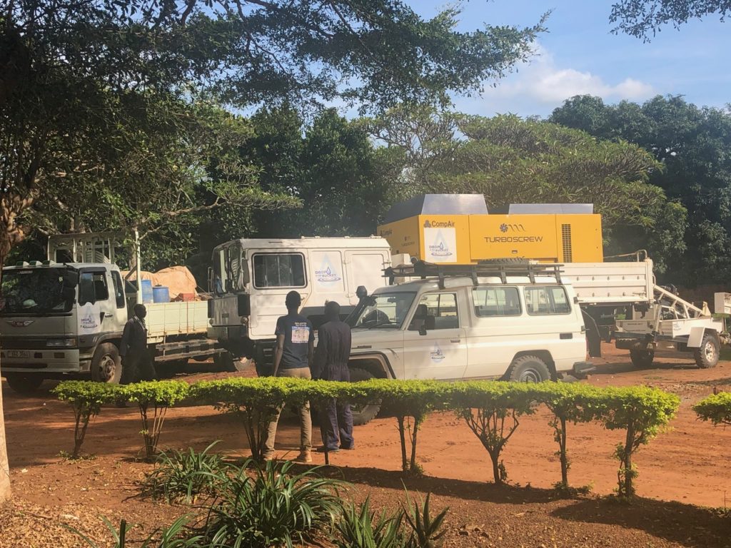 Drop in the Bucket Drillers load the trucks before heading out to start a new drilling project in Uganda.