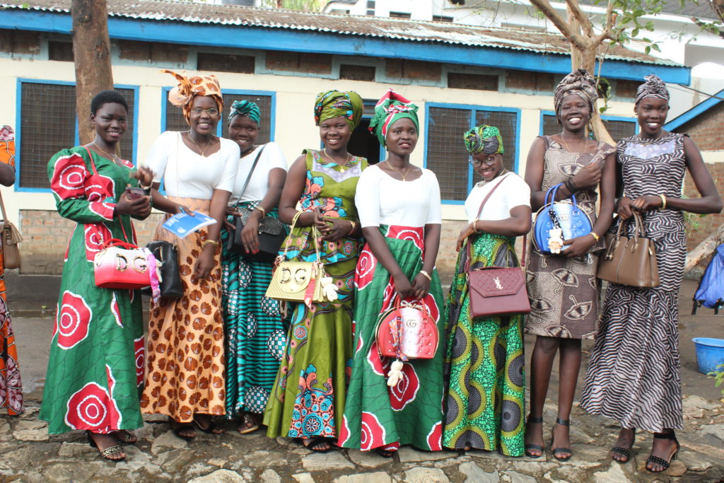 Some of the female students from the Drop in the Bucket education program in South Sudan wearing traditional clothing at their graduation party.