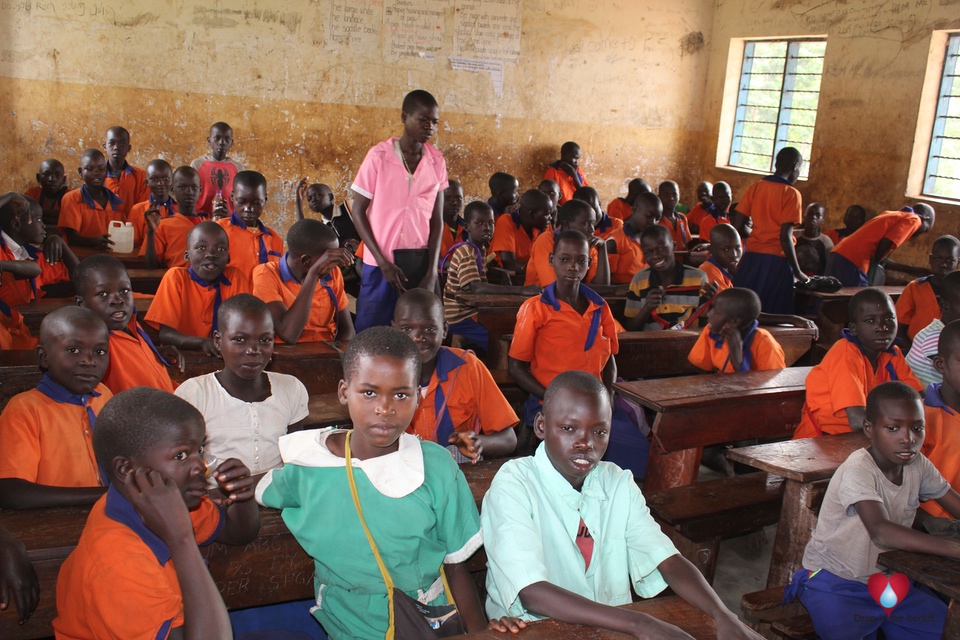Students in their classroom at Amoko Primary School in Pader, Uganda, where a new well provides clean water for learning.