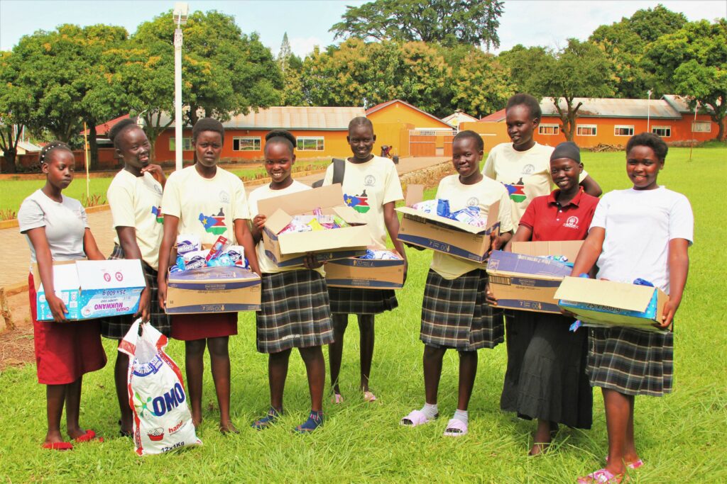 South Sudanese students return to Graceland Girl School in Uganda after the summer break. These girls are sponsored by Drop in the Bucket