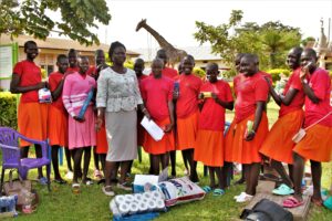 South Sudanese students return to school after the second term break. These girls are receiving scholarships from the US based non-profit Drop in the Bucket