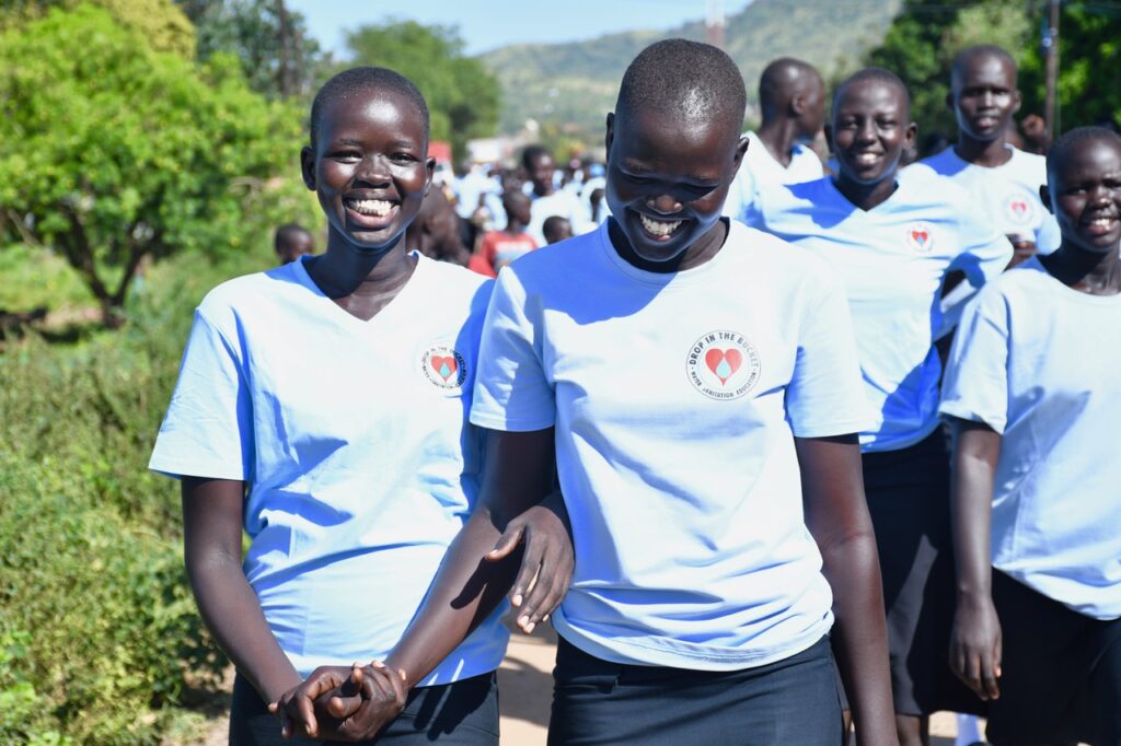 Girls marching for girls rights and gender equality in South Sudan for International Day of the Girl 2024