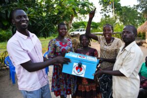 Bidin B VSLA Nwoya Uganda-05 - Drop In the Bucket Drop in the Bucket staff member meets with the Bidin B VSLA group in Nwoya, Uganda.
