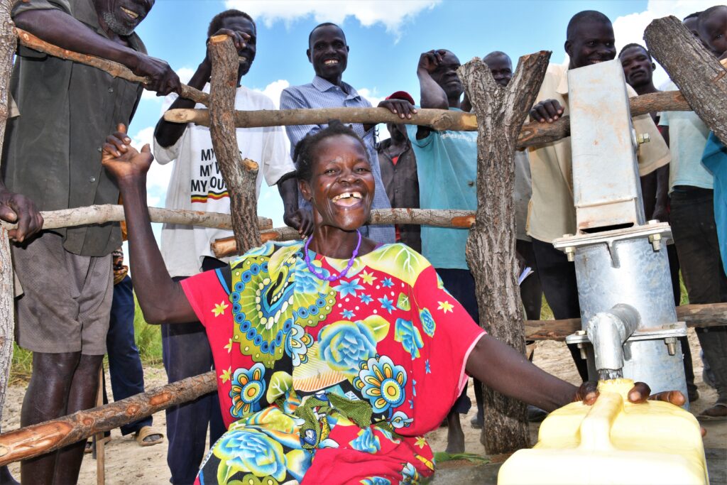 Celebrations as Layik A village in Gulu, Uganda gets a new well drilled by Los Angeles based water charity Drop in the Bucket