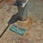 Inscription tile on the new well drilled by Drop in the Bucket for the St. Joseph's primary school in Iganga, Uganda