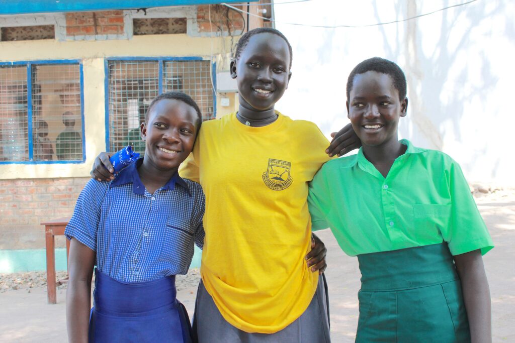 Three girls from Drop in the Bucket's Safe Spaces after school program in Nimule South Sudan