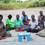 Meeting of the VLSA group formed around the well at Bidin B village in Nwoya, Uganda