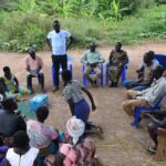 Meeting of the VLSA group formed around the well at Dutdut village in Omoro, Uganda