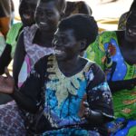 Community members at Awornyim central VSLA (village savings and loan association) meeting