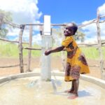 lakuny-gulu-africa-water-well-girl-community.jpg
