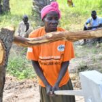 Getting clean water from the new water well in Baribari  in Amuru, Uganda