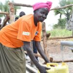 Getting clean water from the new water well in Baribari  in Amuru, Uganda