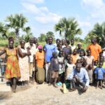 Getting clean water from the new water well in Baribari  in Amuru, Uganda