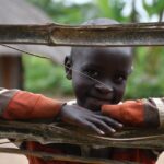 Getting clean water from the new water well in Awer in Amuru, Uganda
