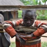 Getting clean water from the new water well in Awer in Amuru, Uganda