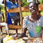 Community members from Kal A 2 Ocega community, getting clean water from the borehole in Nwoya, Uganda