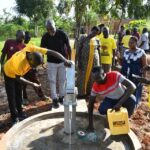 Community members from Ogony village, getting clean water from the borehole in Bargede Layibi Gulu, Uganda