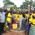 Community members from Ogony village, getting clean water from the borehole in Bargede Layibi Gulu, Uganda