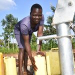 Getting clean water from the borehole in Ogony village, Bargede Layibi Gulu, Uganda