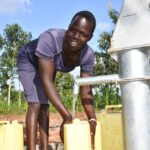 Getting clean water from the borehole in Ogony village, Bargede Layibi Gulu, Uganda