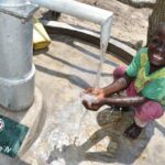 A child from Lakwatomer-Korga-community, getting clean water from the borehole in Koro, Omoro, Uganda