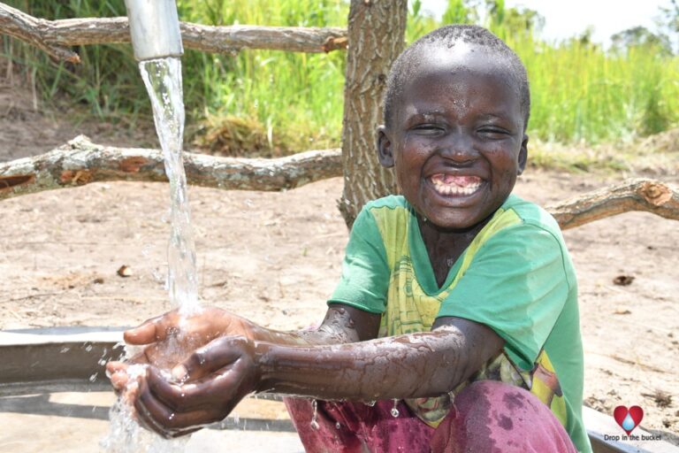 A child from Lakwatomer-Korga-community, getting clean water from the borehole in Koro, Omoro, Uganda