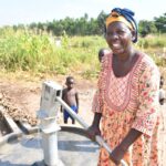 Getting clean water from the borehole in Panycwala village, Laroo-Pece-Gulu, Uganda