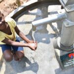 Getting clean water from the borehole in Panycwala village, Laroo-Pece-Gulu, Uganda