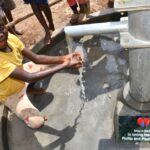 Getting clean water from the borehole in Panycwala village, Laroo-Pece-Gulu, Uganda
