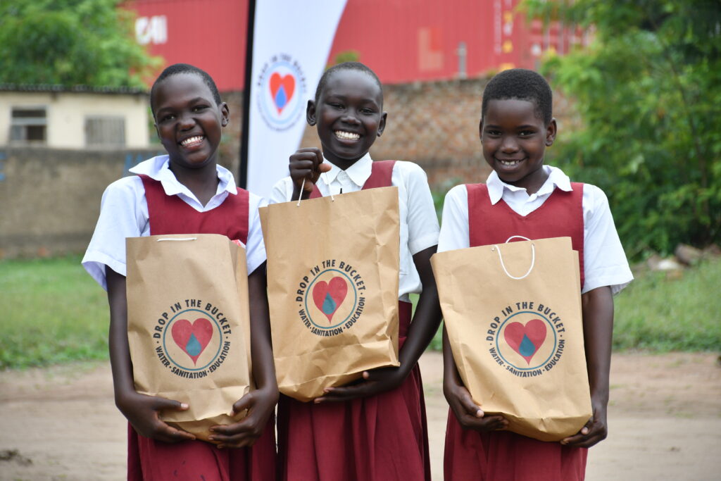 Three girls from Drop in the Bucket's education program in South Sudan