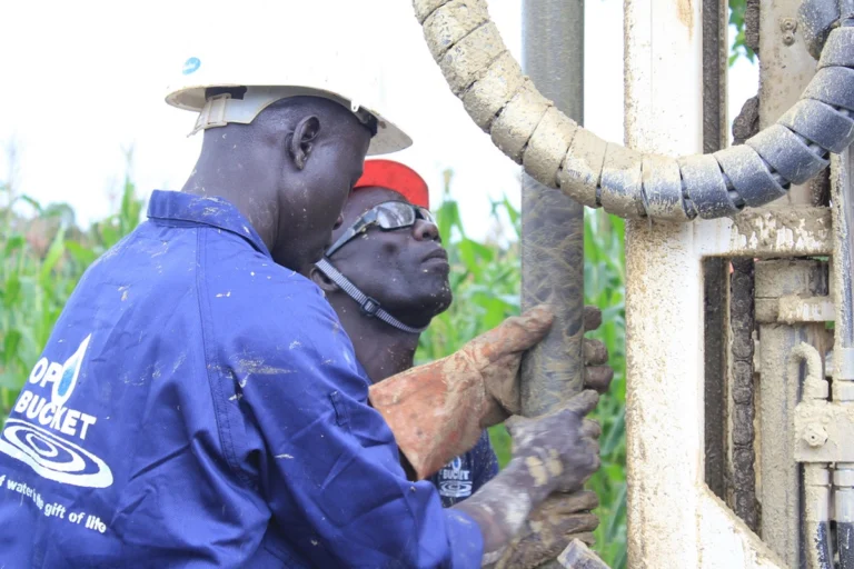 Drop in the Bucket drillers operating a Pat Drill 301T in Uganda