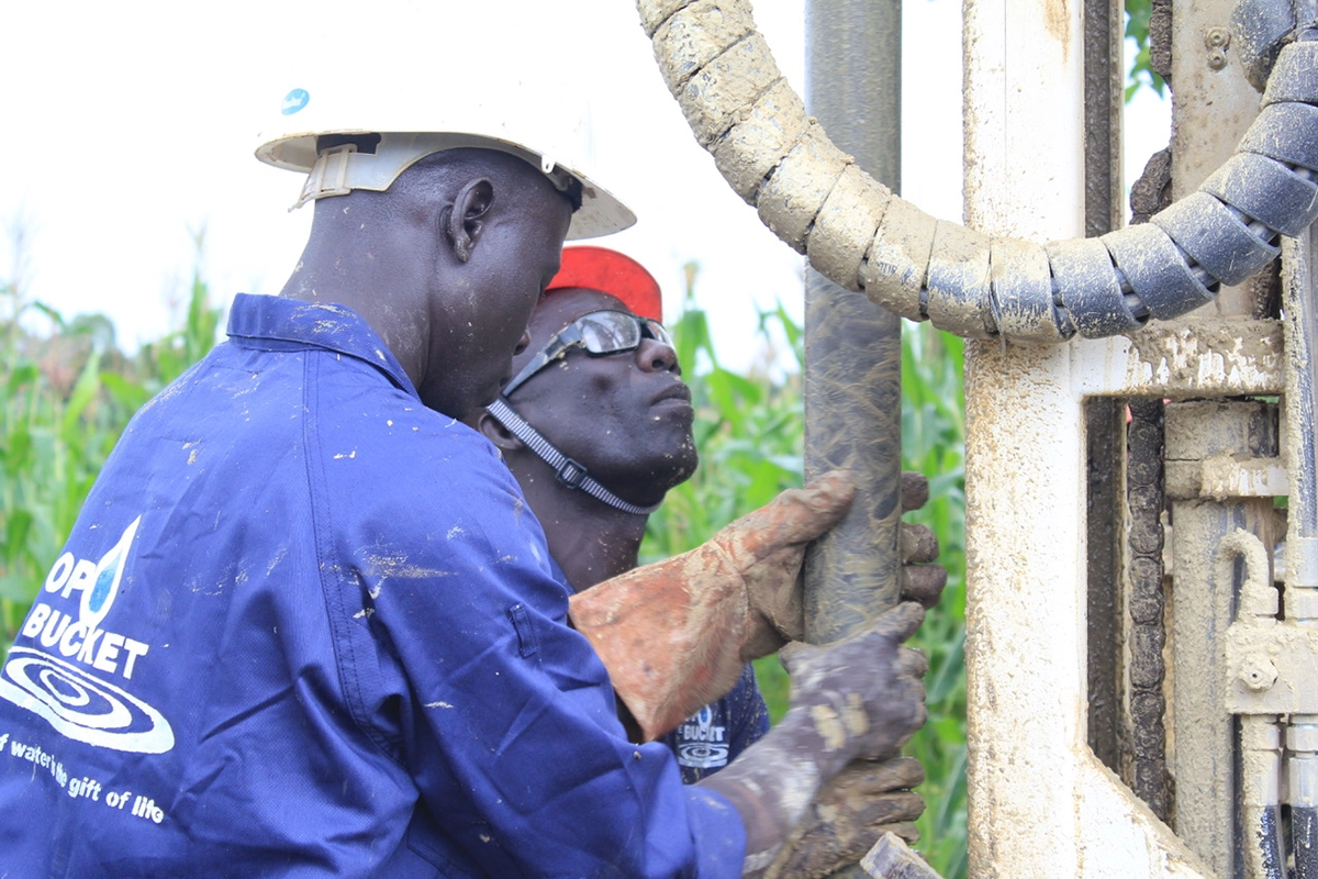 Drop in the Bucket drillers operating a Pat Drill 301T in Uganda