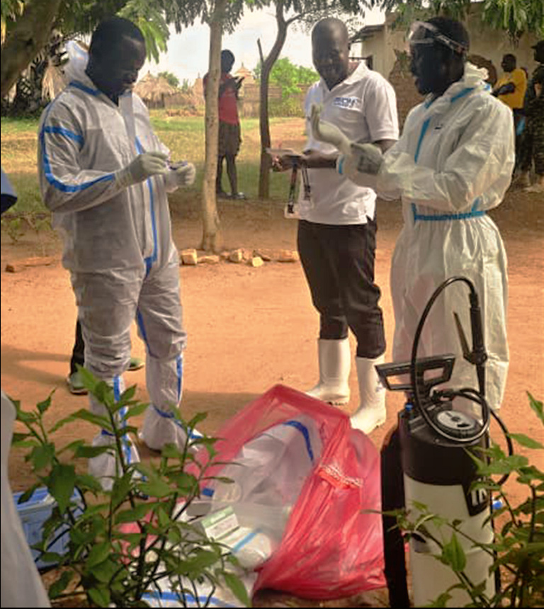 Ugandan health workers near the border between Uganda and the DRC going village to village to help stop the spread of Ebola during the current outbreak.